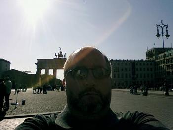 Me in front of Brandenburg Gate -- self pic with cell phone.