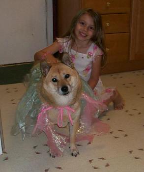 Nancy and Phoebe - little girls like to dress their animals