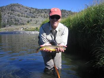 My Dad. He caught the fishy and now he has to pee...lol.